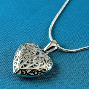 Filigree heart pendant on silver chain